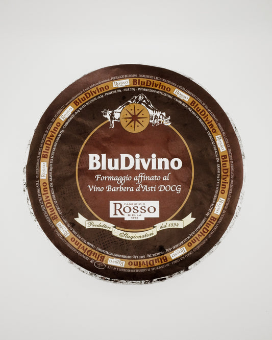 BluDivino cheese wheel with label on a white background