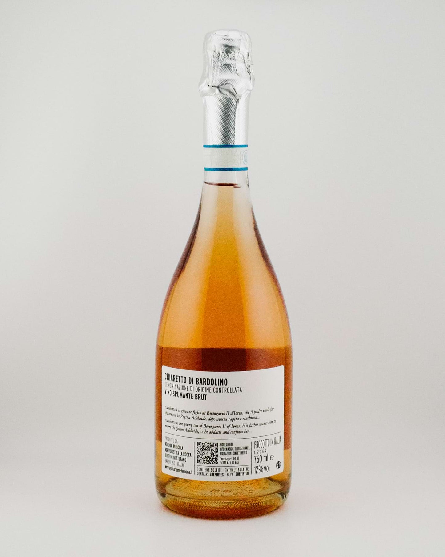 Bottle of Rosé wine with a label on a light gray background