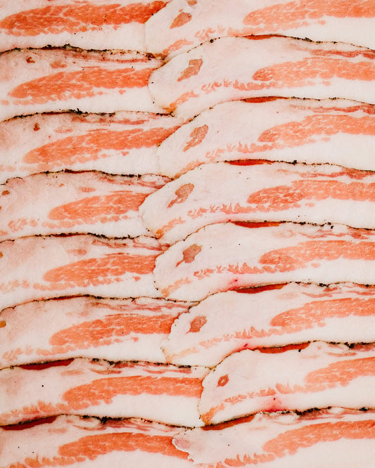 Close-up of sliced Guincale with a pinkish-red color.