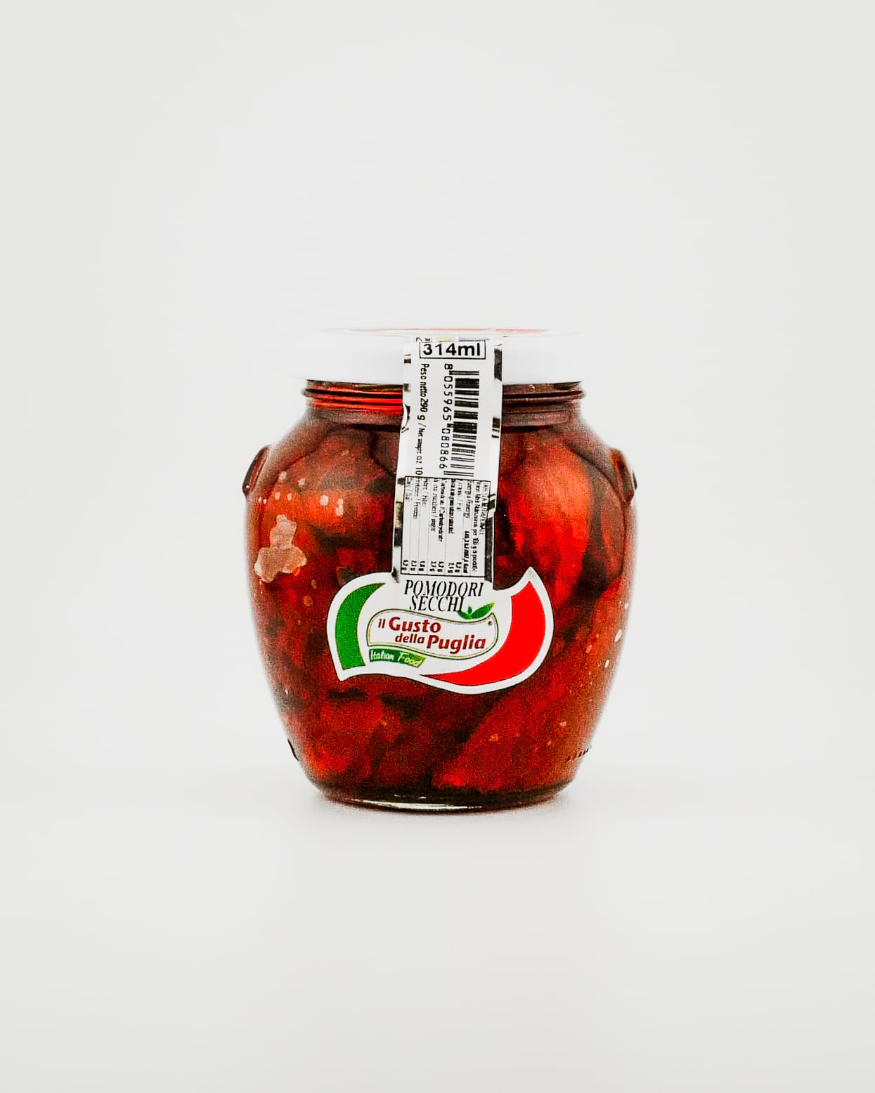 Jar of preserved tomatoes with a label on a white background
