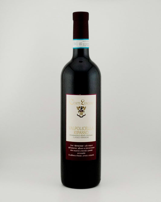Wine bottle with a label on a gray background